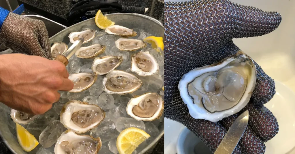 someone shucking oysters