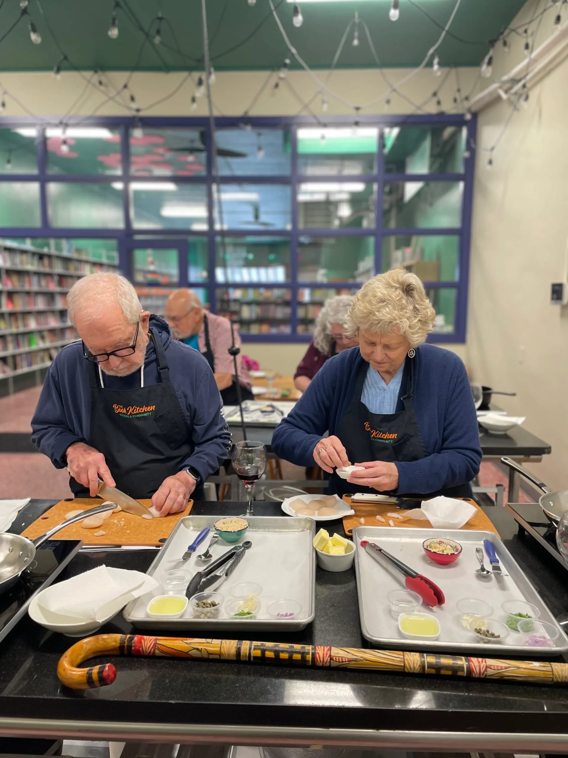 people in a cooking class working on a recipe