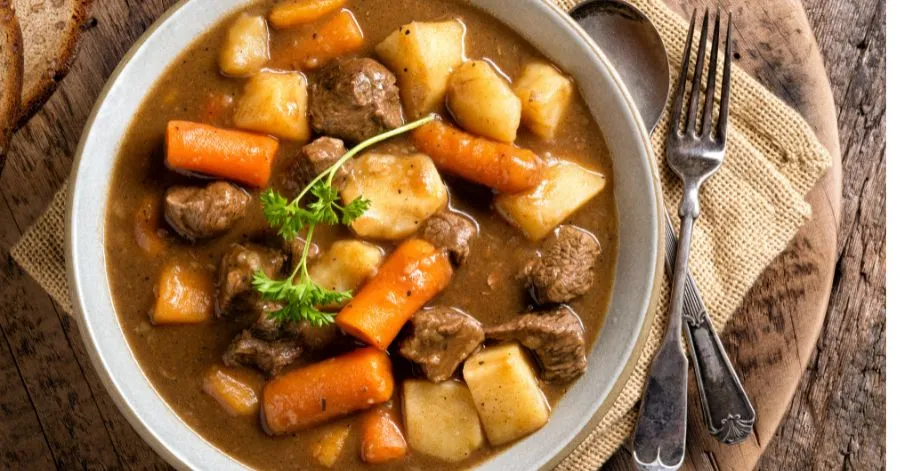 Beef stew in a large bowl.